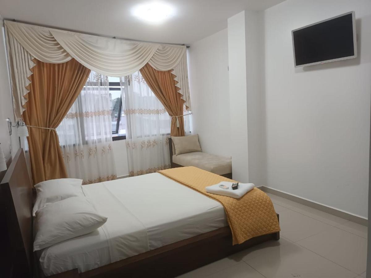 Hotel Quezada Hermanos Santo Domingo de los Colorados Extérieur photo