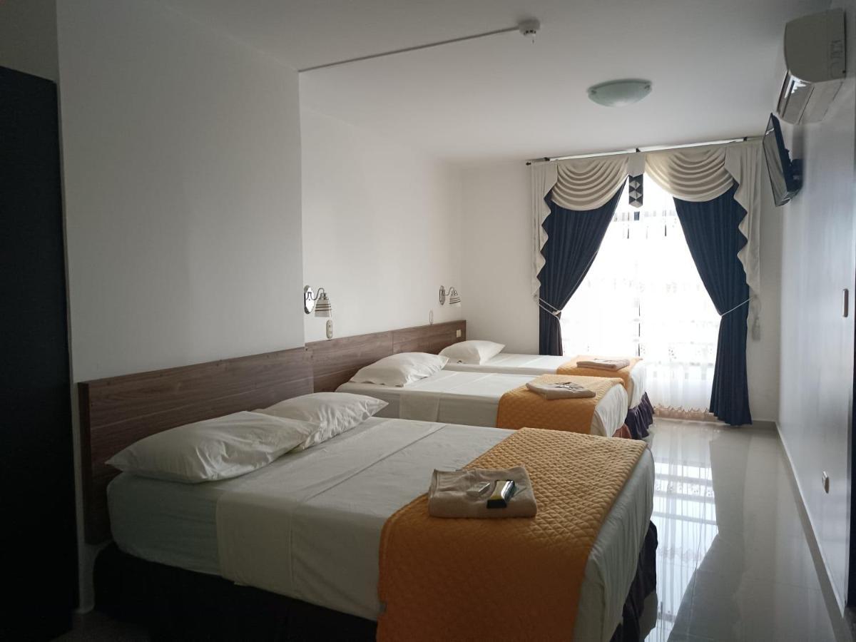 Hotel Quezada Hermanos Santo Domingo de los Colorados Extérieur photo