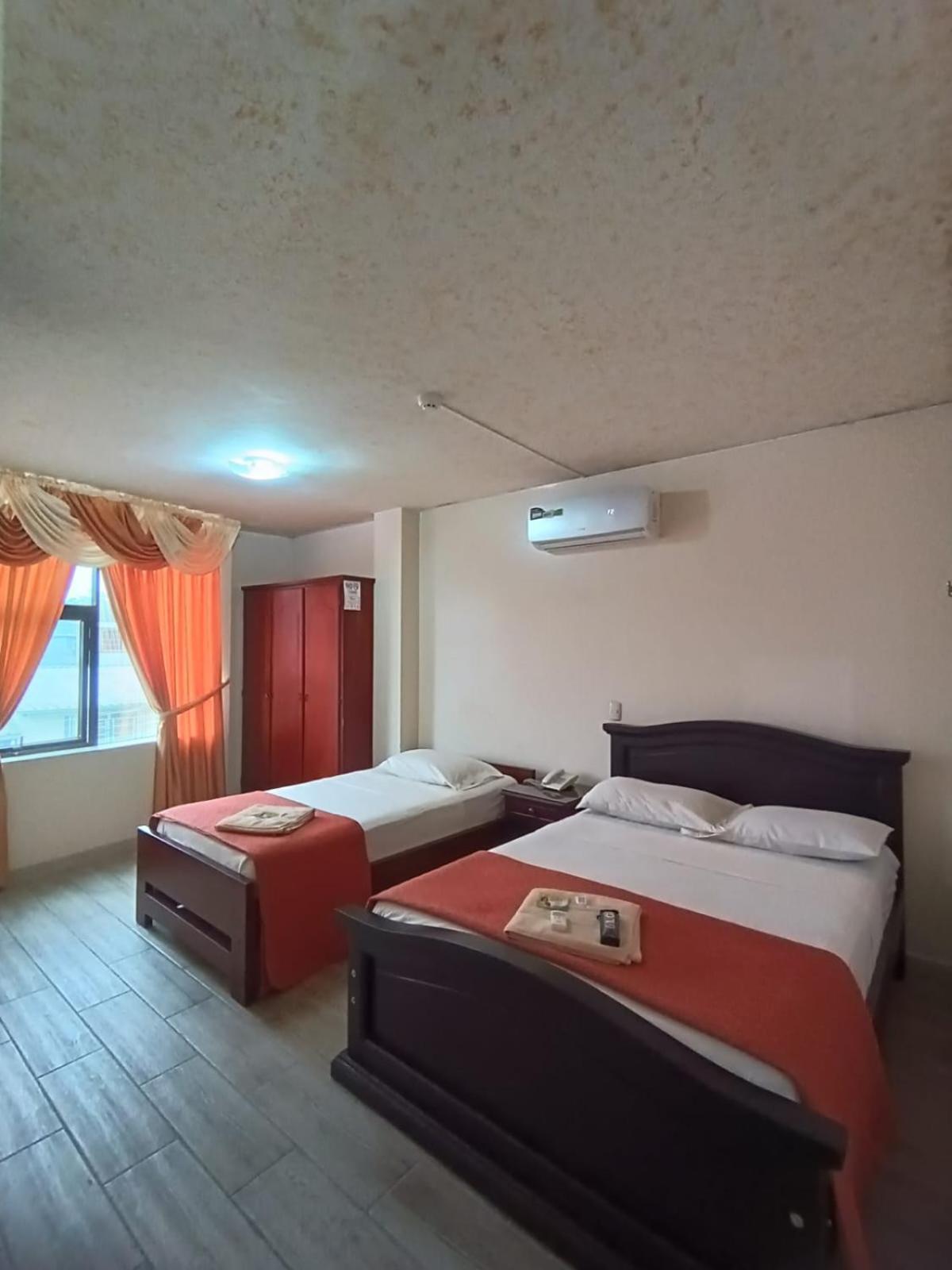 Hotel Quezada Hermanos Santo Domingo de los Colorados Extérieur photo